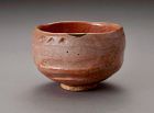 A Red Raku Tea Bowl by Famed Potter Ichigen (1662 - 1722)