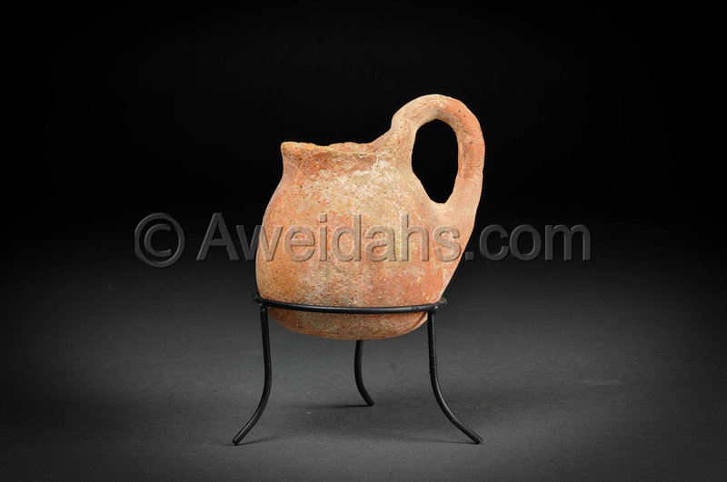 Chalcholithic Age pottery jar with a looped handle, 3500 BC
