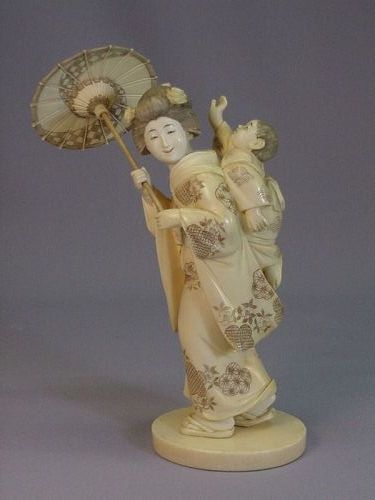 Japanese ivory carving of mother and child