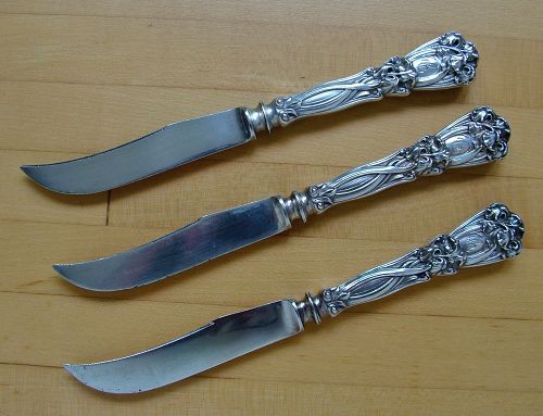 Durgin IRIS orange knives, three