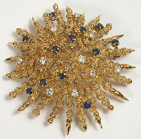 Tiffany and Co. 18Kt floral brooch, sapphires, diamonds