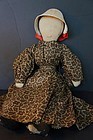 Early brown calico dress on an antique cloth doll  20"