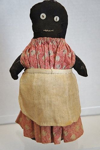 a plain and simple small black bottle doll door stop