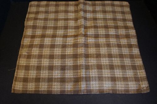 15" by 17" brown cotton doll coverlet with tied quilting