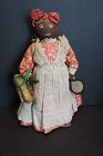 Antique black cloth doll with name and address of maker C 1890-1910