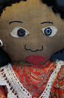 Sweet little black doll that has early snaps for eye and fancy legs