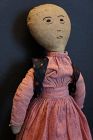 Simple flannel rag doll with nicely embroidered face.16" tall C. 1890
