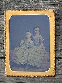 Full plate of two sisters in identical dresses c. 1850