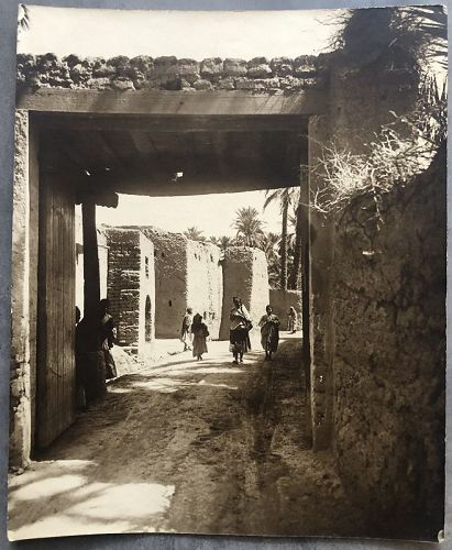 Photograph of gate and street at Sidi Okba, Algeria 20th c.