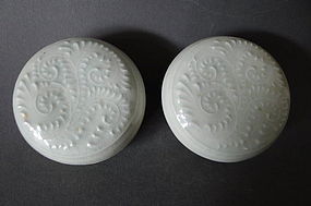 A pair of Song Dynasty moulded Qingbai covered boxes