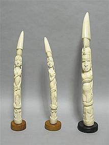 THREE AFRICAN IVORY TUSKS DEPICTING STANDING LADIES