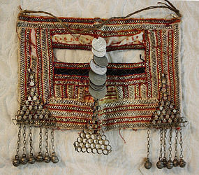 Woman's ornate tribal face cover from Saudi Arabia