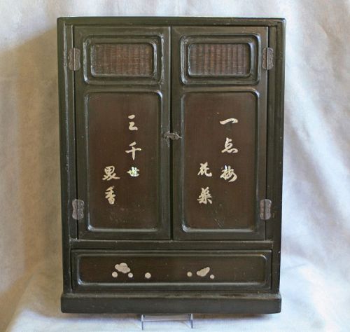 Antique Chines Qing Dynasty lacquer cabinet with Mother of Pearl inlay