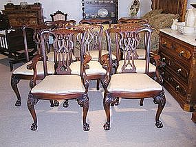 Eight Heavily Carved Mahogany Dining Room Chairs