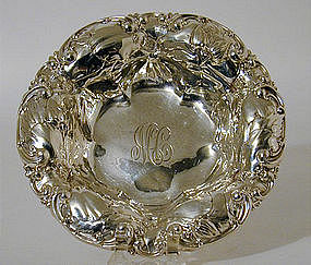 An American Silver Dish With Repousse