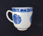 Peach, Peony and Aster on a blue & white cup, Qianlong