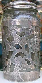 Glass container with silver applique