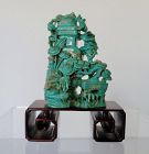 Late Qing carved turquoise stone snuff bottle on zitan stand