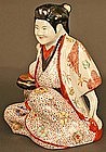 Japanese Antique Porcelain Seated Girl, 19th Century