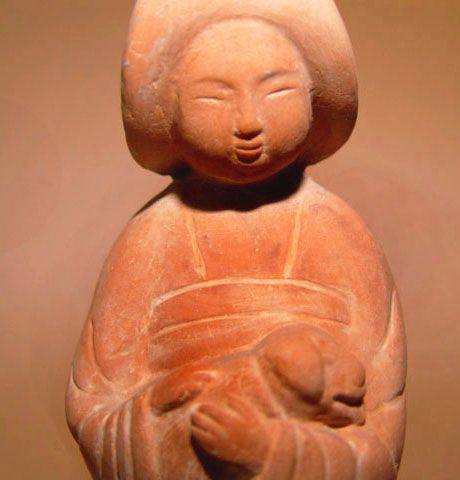 Rare Seated Tang Lady Cradling a Dog - 618 - 907 AD