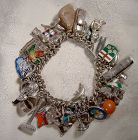 Exceptional Chain Link Sterling Silver Charm Bracelet with 39 Charms