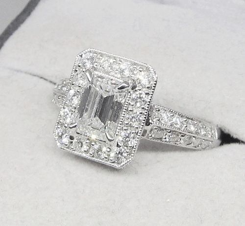 18 Kt Gold and Emerald Cut Diamond Engagement Ring