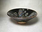 A Charming Black Bowl With Partridge-Feather Mottles.