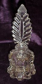 Old fancy glass perfume bottle with feather  stopper