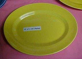 HLC Harlequin yellow oval platter 9"x 11 1/2"