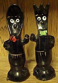 Vintage black anthropomorphic fork and spoon shakers