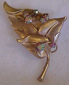 Vintage goldtone leaf pin with aurora rhinestones