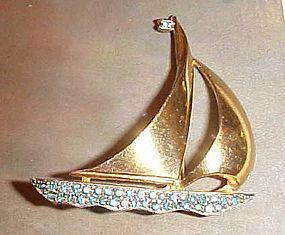Vintage gold tone sailboat pin with rhinestones