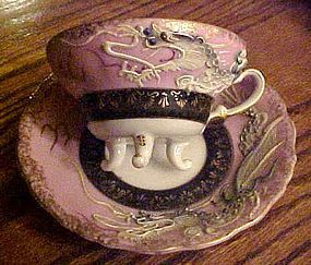 Fancy vintage dragon ware three feet cup and saucer set pink & black