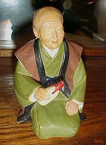 Vintage Hakata Urasaki old man with bottle figurine