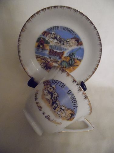 Vintage souvenir cup and saucer South Dakota Black Hills and Badlands