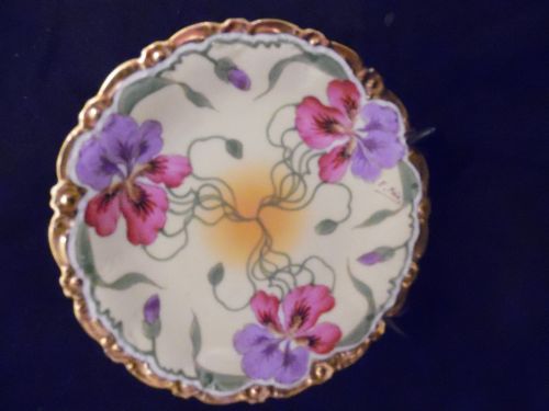 Stouffers red and lavender iris'  Limoges cabinet plate signed E. Feix