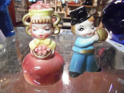 Vintage girl with apples and winking boy with pie salt pepper shakers