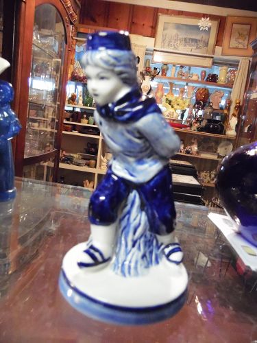DALC  Delft Blue skating boy figurine  5 3/4"