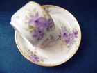 Antiques Violets demitasse cup and saucer set