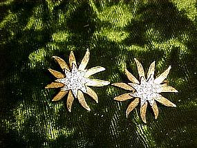 Sunstar goldtone and silver earrings