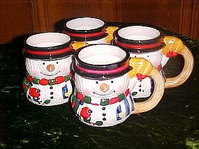 Four ceramic snowman mugs, by Carson ceramics