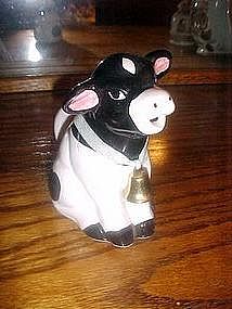 Sitting black and white cow cream pitcher w/bell