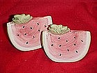 Large watermelon slices, salt and pepper shakers