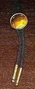 Western bolo tie with star center.