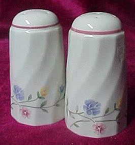 Swirl salt and pepper shakers with flowering vines