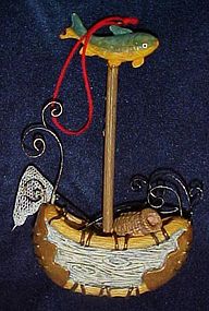 Fishermans Christmas ornament, birch bark canoe
