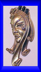 Portrait of a woman  sterling brooch unsigned 1942