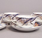 Fukagawa Iris pattern tea cup and 5 3/8 inch saucer