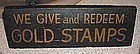 1920s "We Give and Redeem Gold Stamps” Wooden Store Display Sign