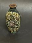 Chinese antique molded polychrome porcelain snuff bottle.
